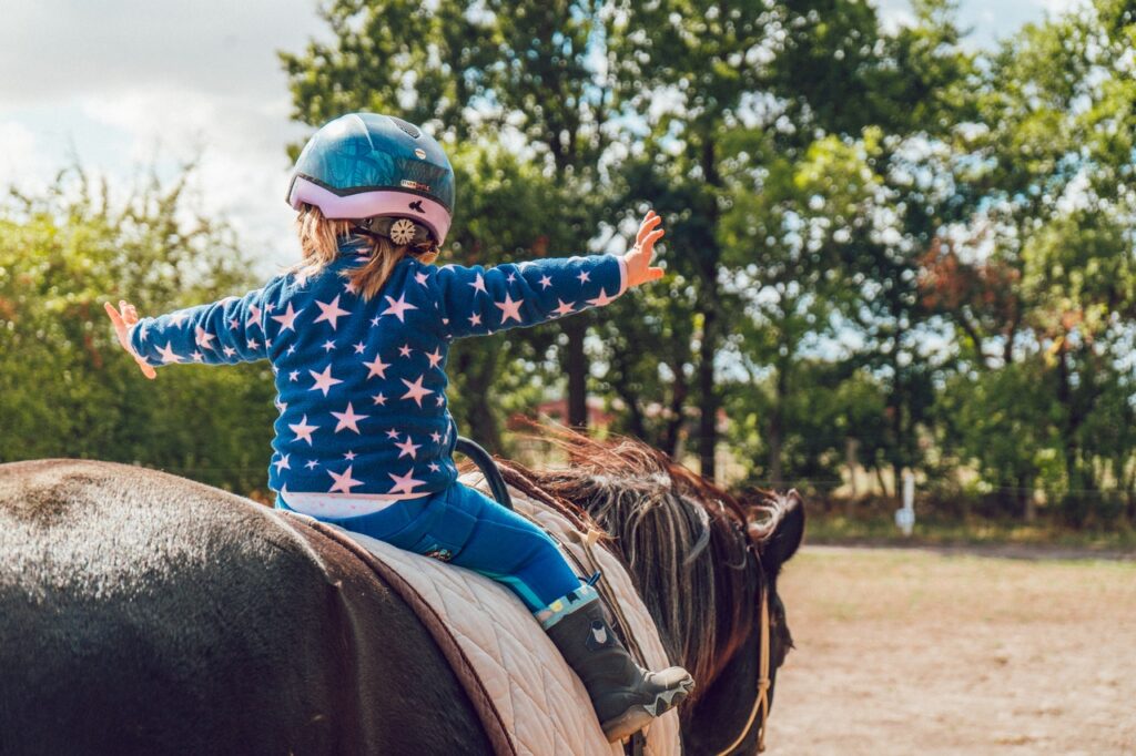 girl riding horse